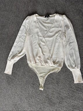 Lulu's Ivory Textured Surplice Long-Sleeve Bodysuit